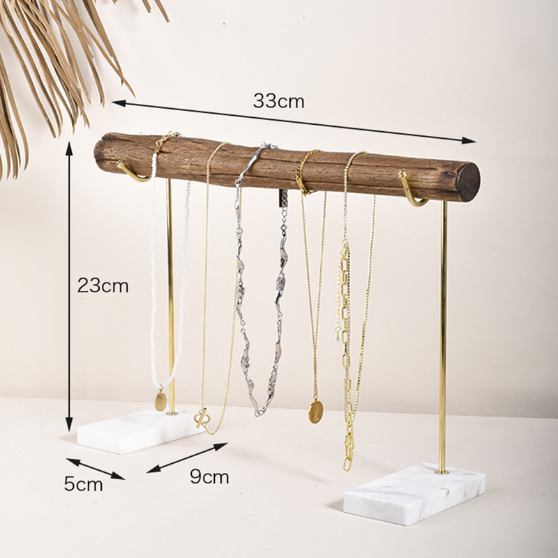 Taller necklace display rack with pearl and chain necklaces on brass hooks