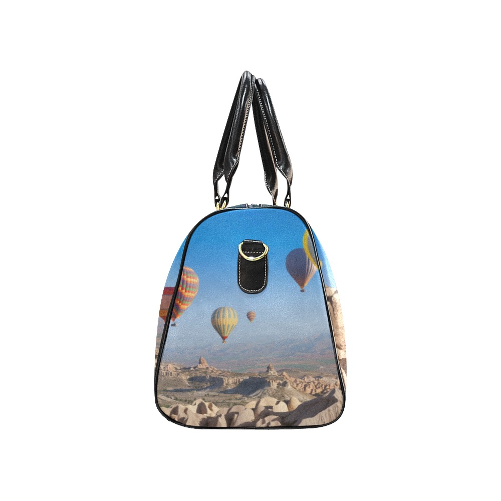 Black travel bag (Model 1639) with hot air balloon design, waterproof, side view.