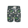 Men's mid-length swim shorts with black base and green pattern, elastic waist and drawcord