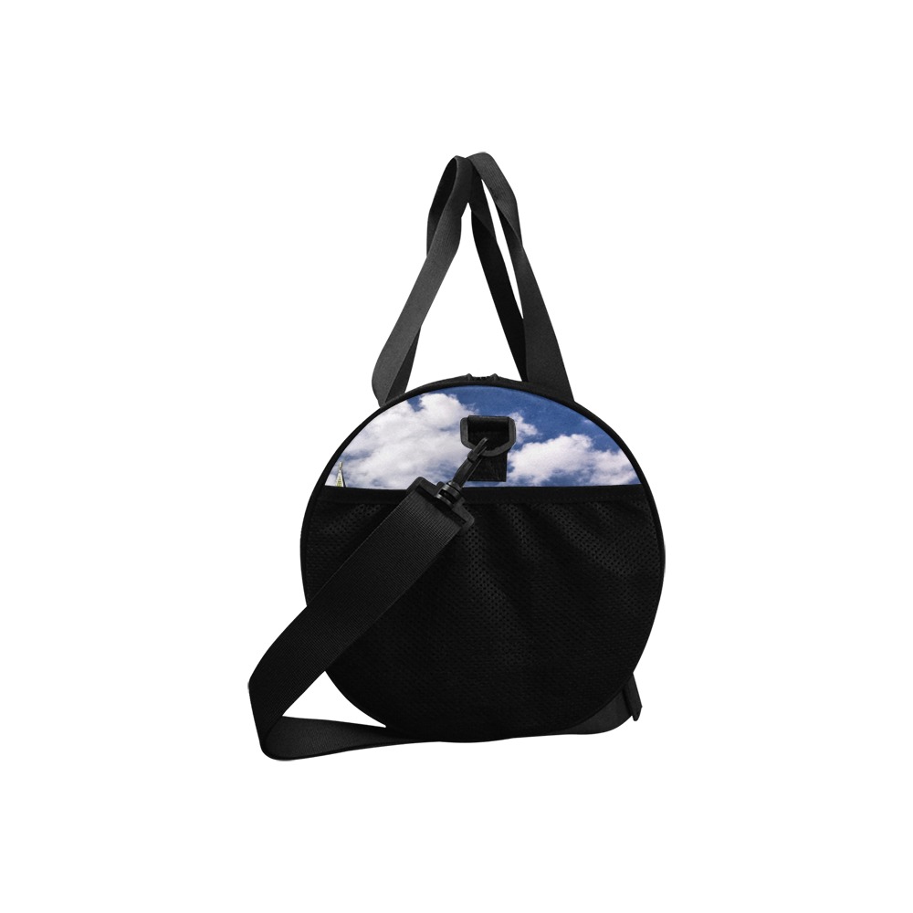 Model 1679 Travel Duffel Bag with cloud print, adjustable strap and water-resistant fabric.