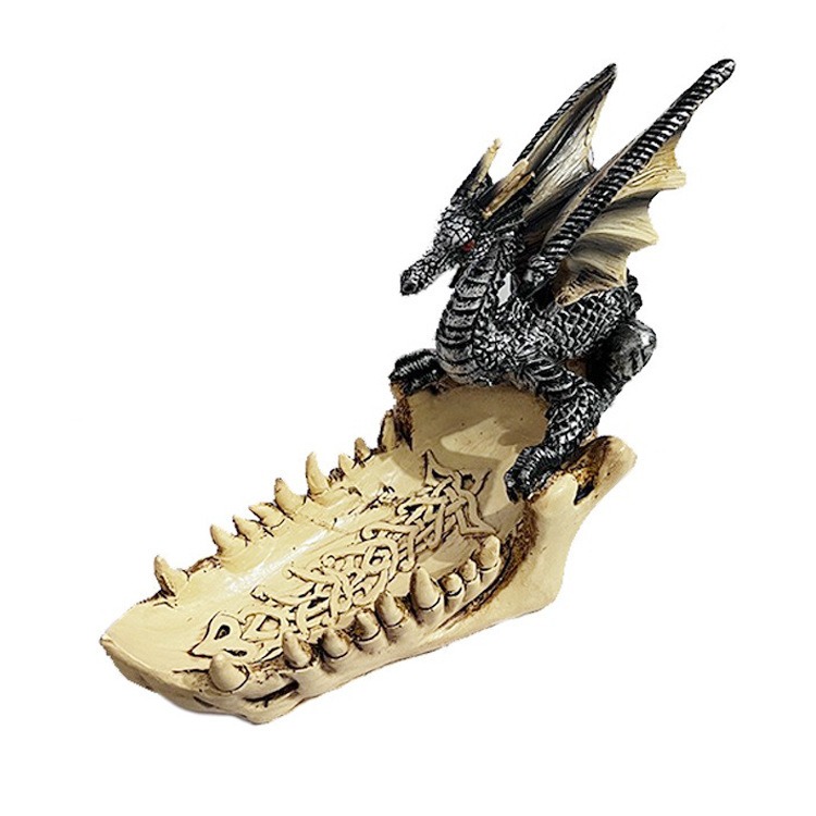 Dragon sculpture tray photographed in an everyday home setting