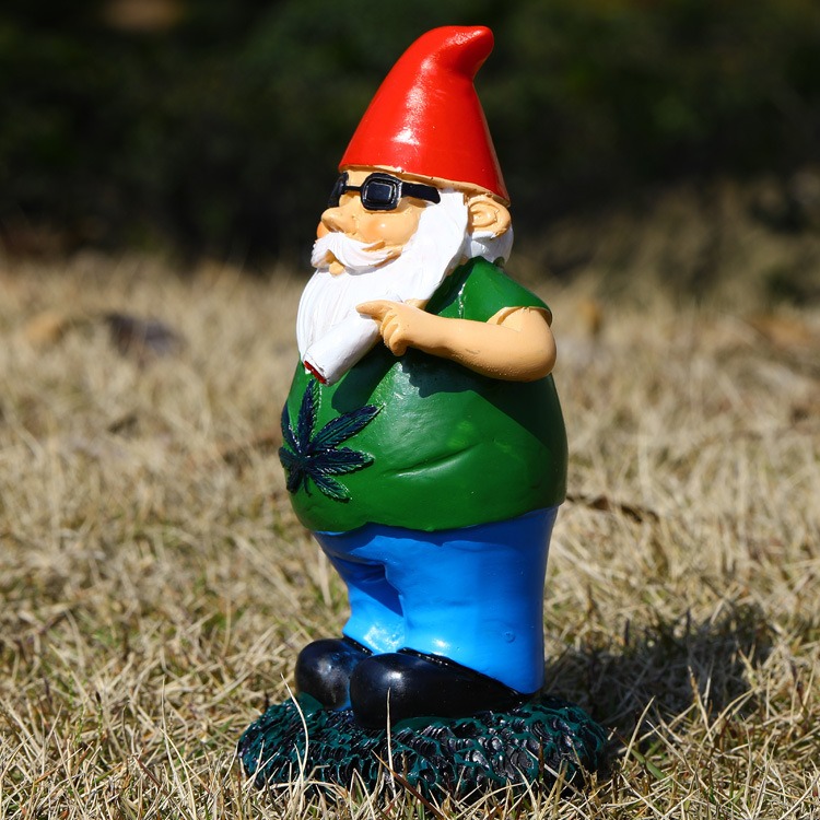 Side view of gnome standing on grass showing body profile and base