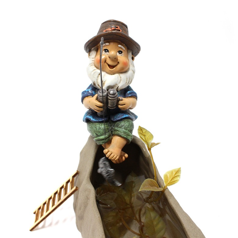Planter scene with greenery before a decorative gnome is added