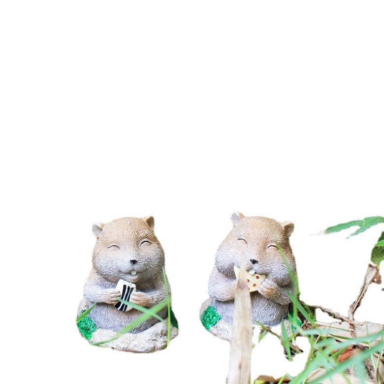 Close view of gopher figurine fur, face detail and green moss base