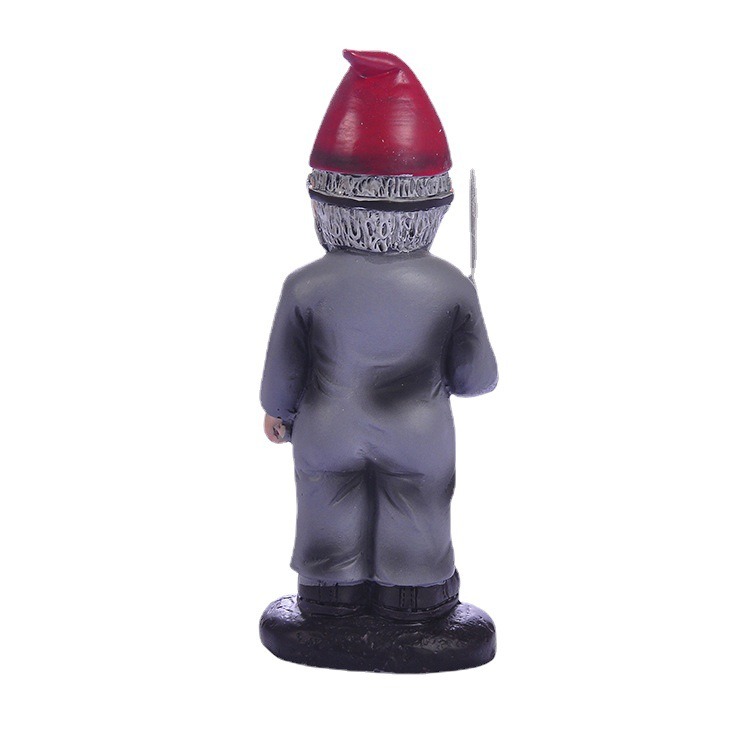 Back view of a resin gnome with grey coveralls and red hat