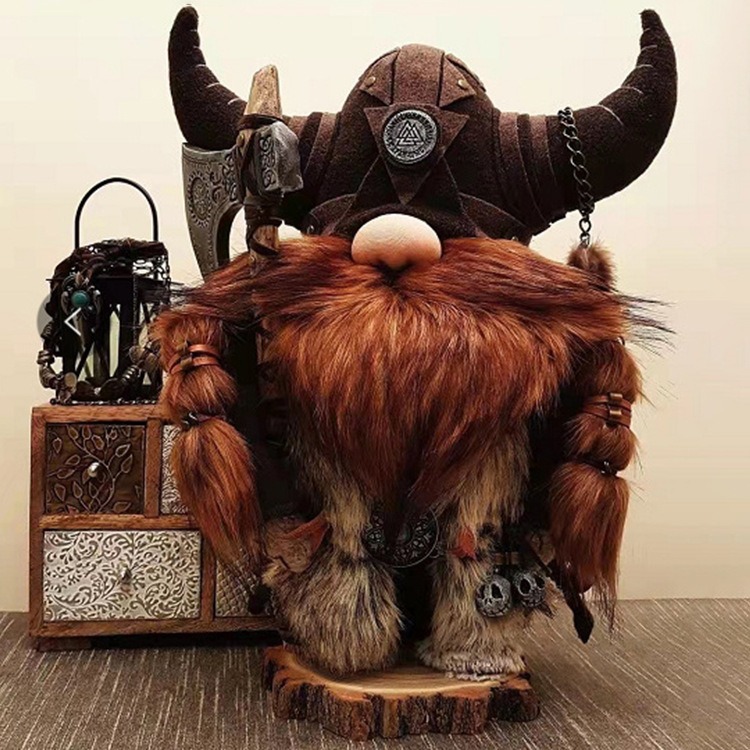 Viking dwarf figure styled on a wooden shelf beside a lantern