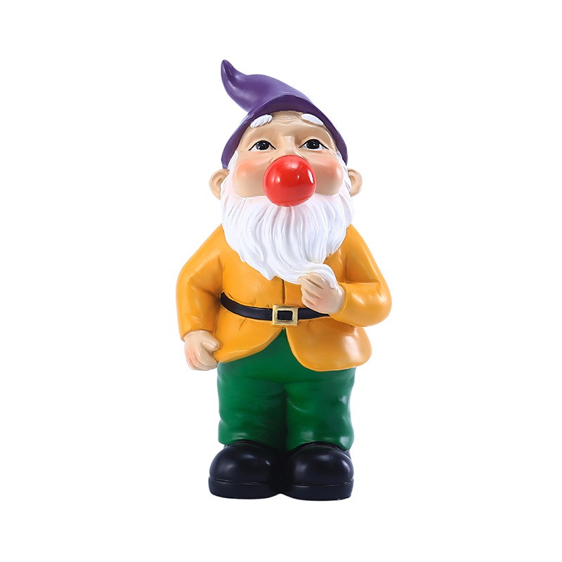 Resin gnome with a red bubble gum close up