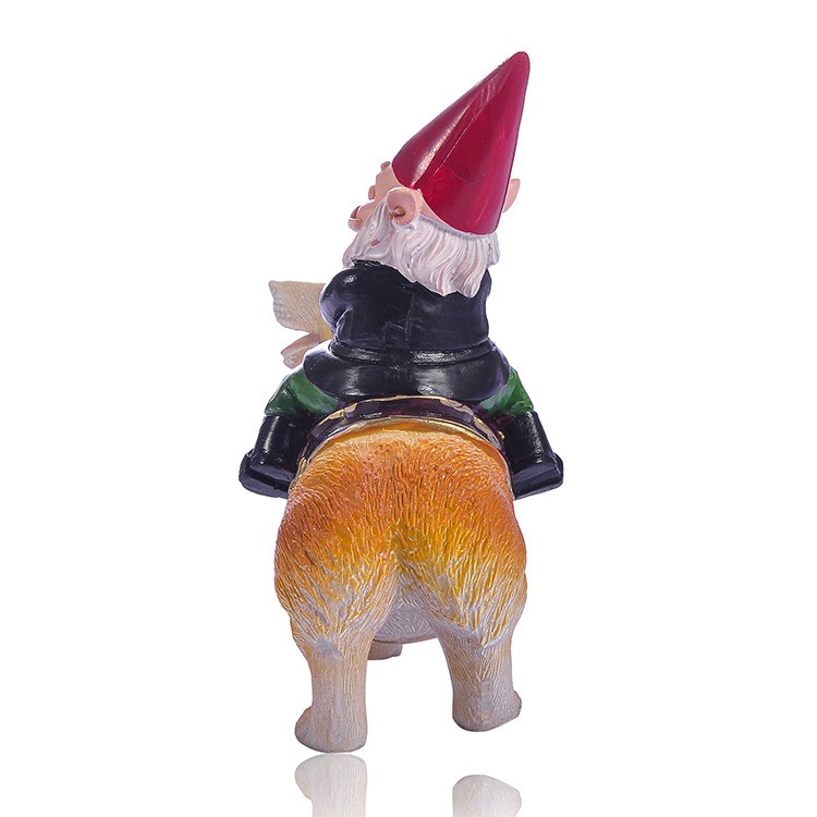Rear view of gnome on corgi figurine showing fur texture and construction