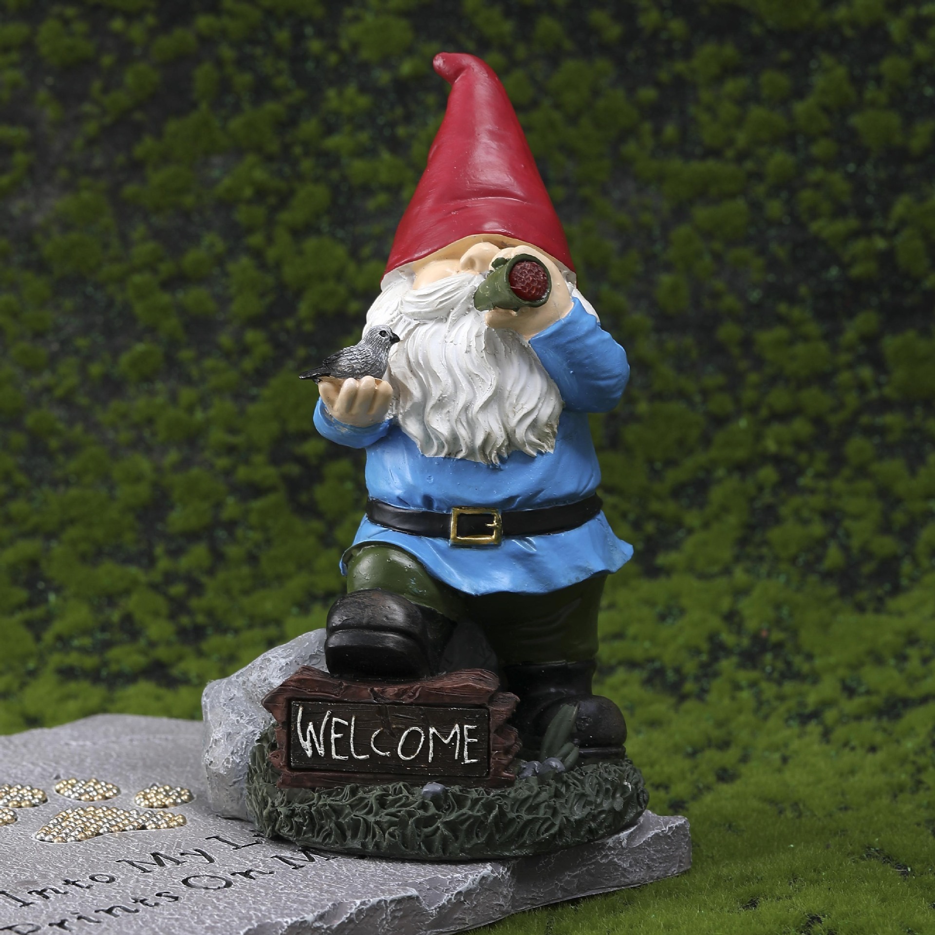 Close view of gnome figure with painted hat and coat details
