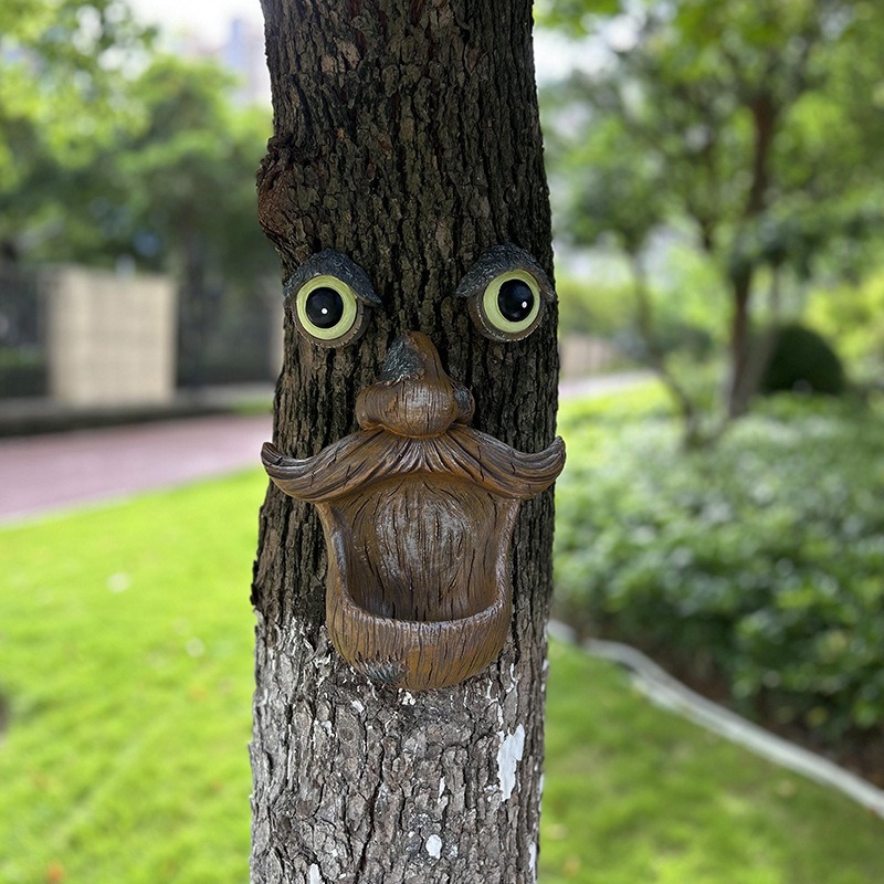 Bark trunk in a garden before the resin face is mounted