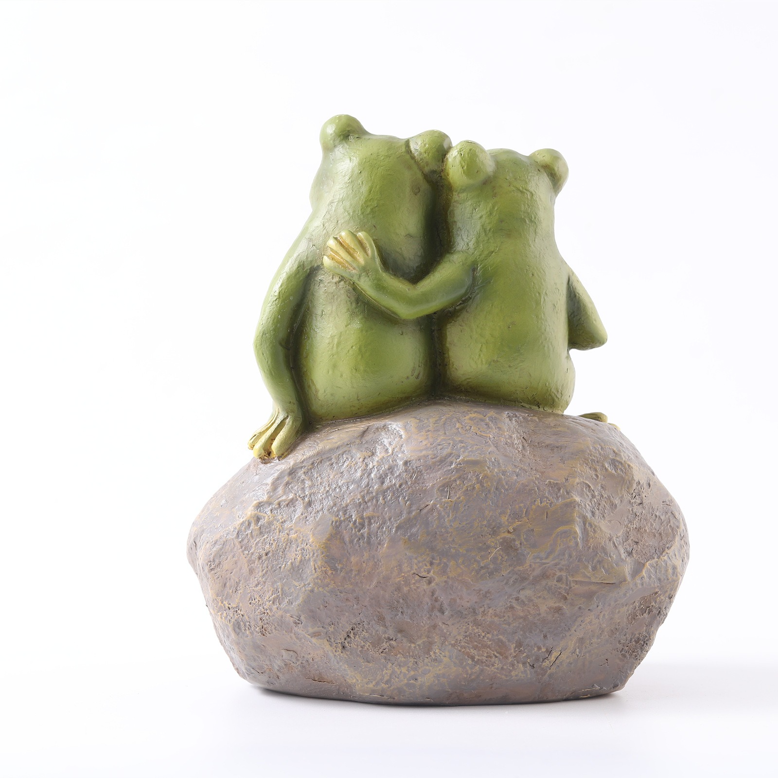 Rear view of the frog pair showing the matching embrace detail