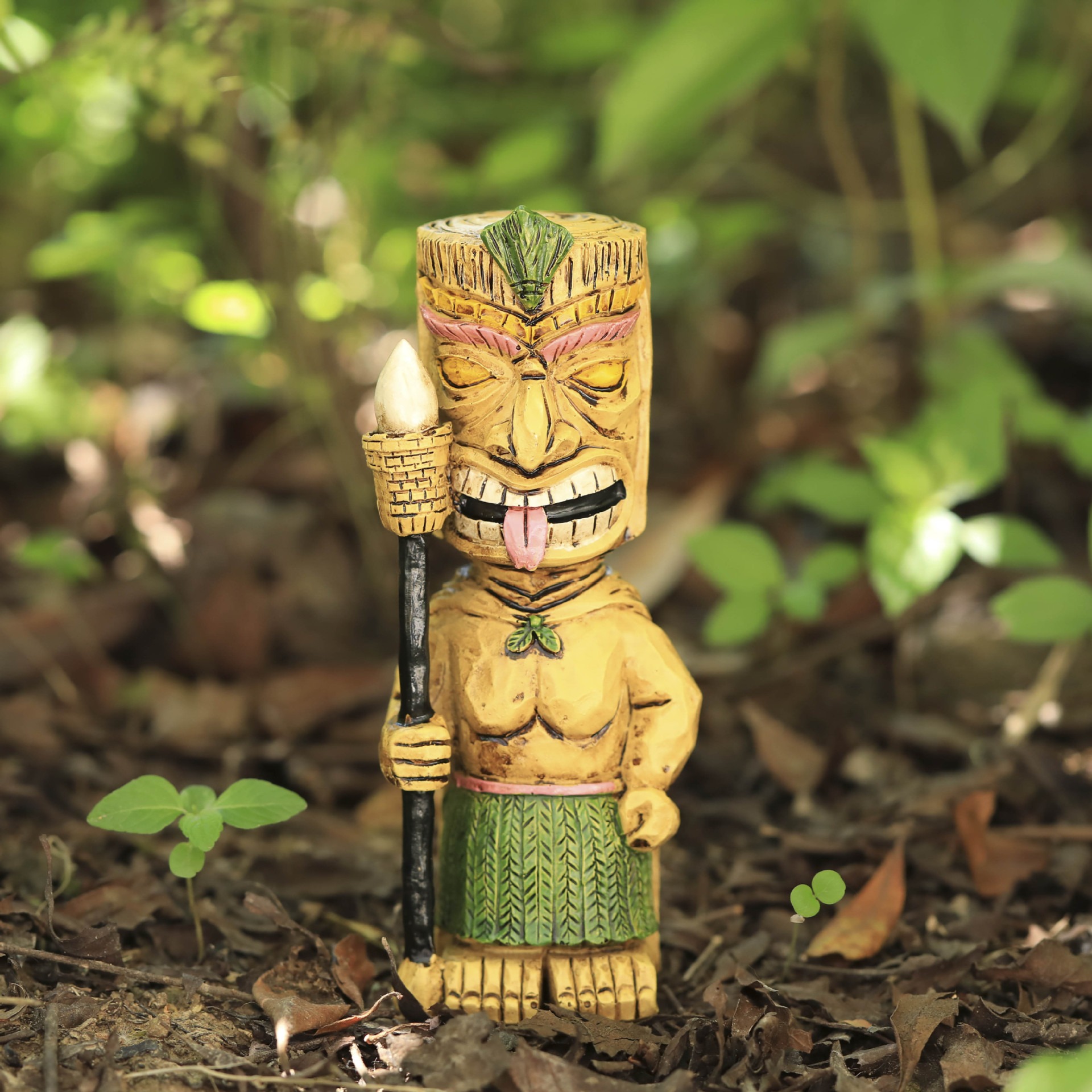 Tiki totem standing in a garden corner as a focal point