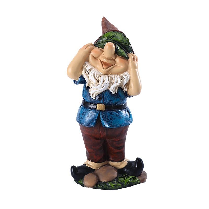 Resin gnome with hands over eyes, white beard, standing on grass base
