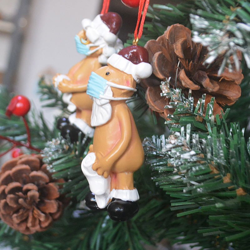 Resin Santa ornament photographed in a bright editorial setting
