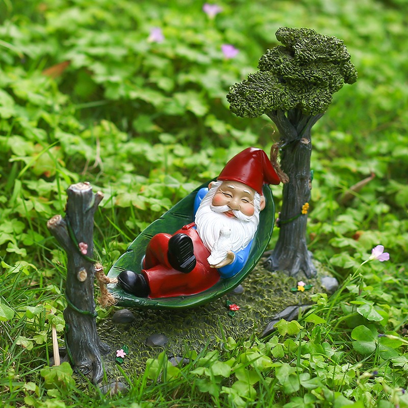 Garden corner with green plants where a figurine could sit