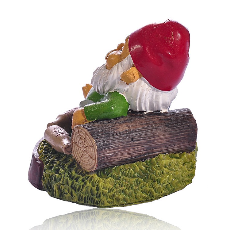 Profile of reclining gnome with raised arm and log armrest