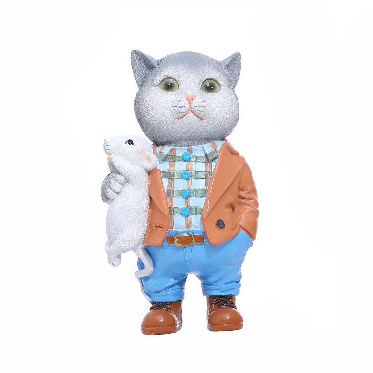 Full front view of the dressed cat figurine on a white background