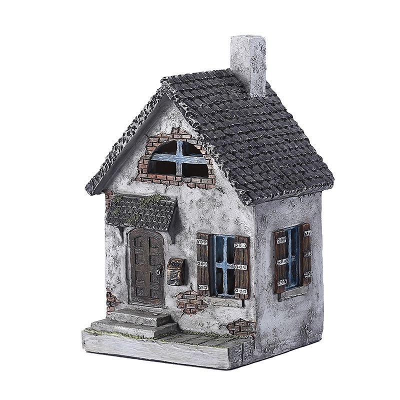 Grey resin cottage detail with textured walls and tiled canopy