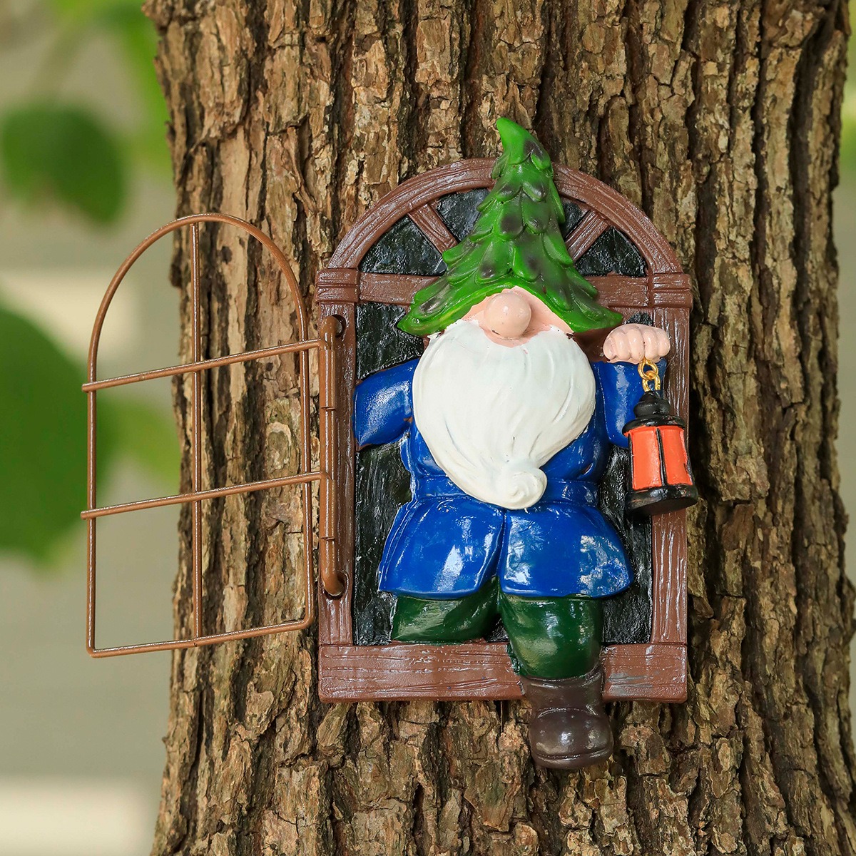 Close-up of the hand-painted gnome window with rustic frame texture