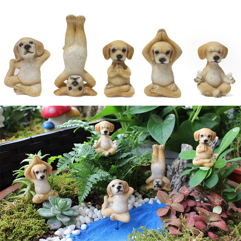 Puppy figurine planted in soil on a thin green wire stake
