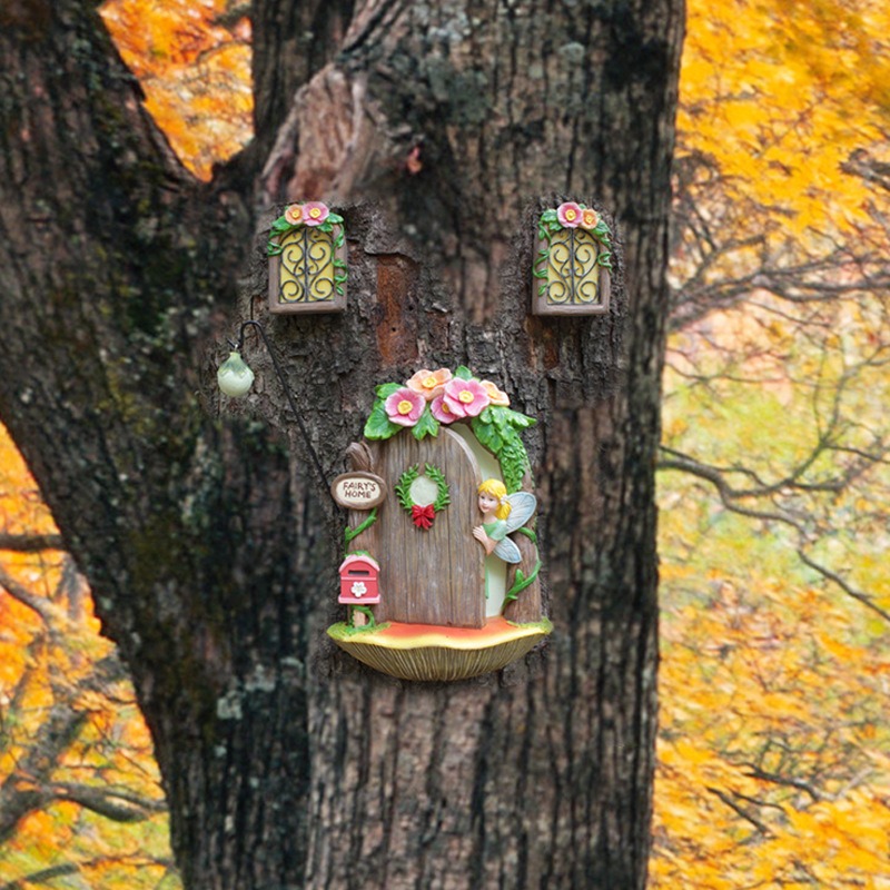 Fairy home set on a large tree trunk in an autumn forest