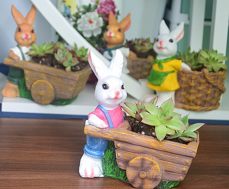 Rabbit planters in warm white and rose pink with hand-painted detail
