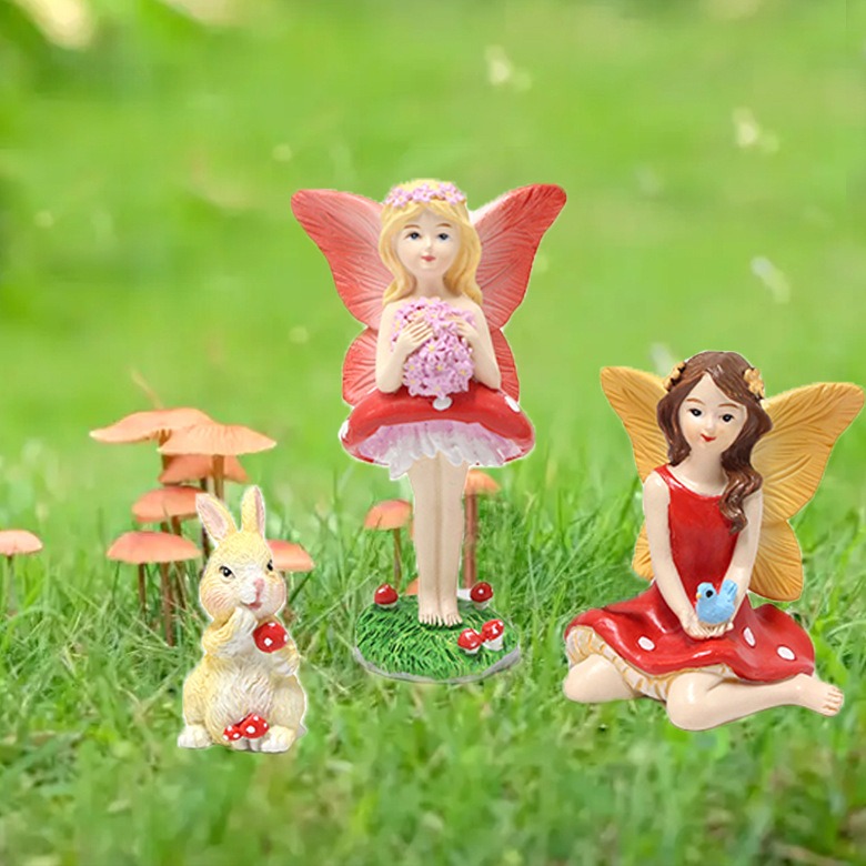 Standing fairy, seated fairy and rabbit grouped together as one set