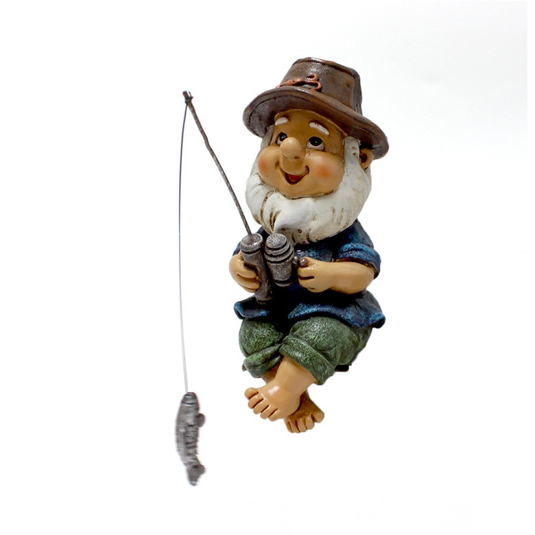 Front view of gnome with fishing rod and fish dangling on a wire