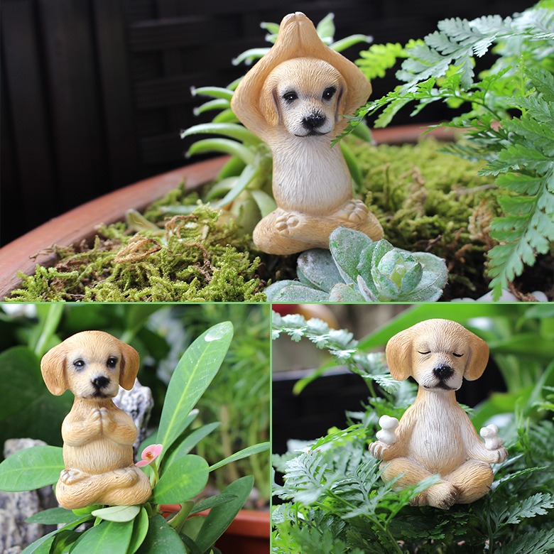 Close view of a tan resin puppy figurine with painted face detail