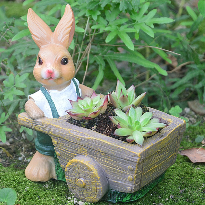Rabbit planter resting on a bare desk corner in soft daylight