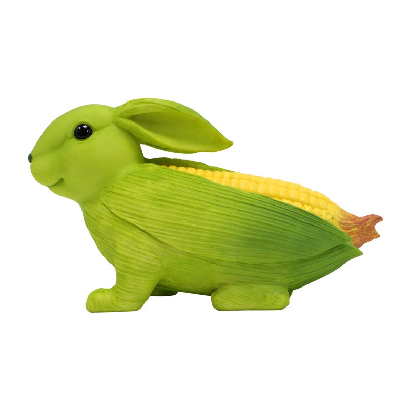 Lime green resin rabbit with corn husk body and yellow kernels, side view