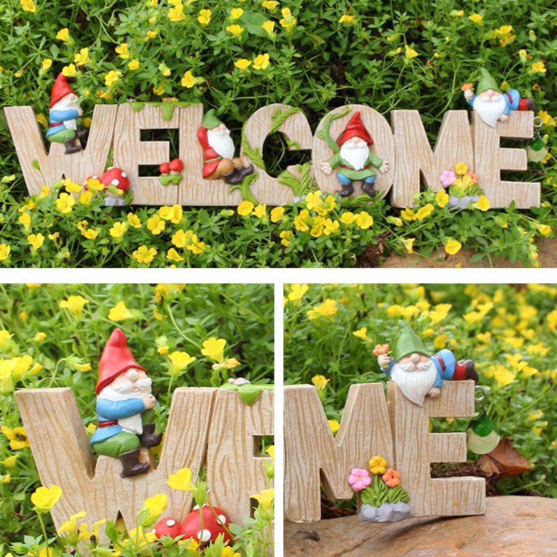 Painted gnome welcome sign shown with its hand-painted details