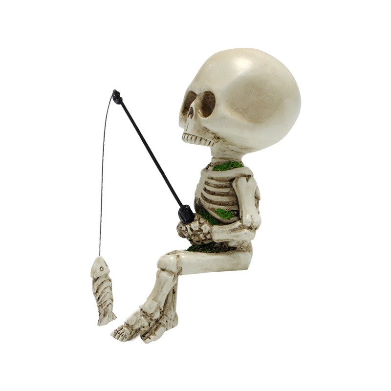 Side profile of skeleton fisherman with the fishing rod extended
