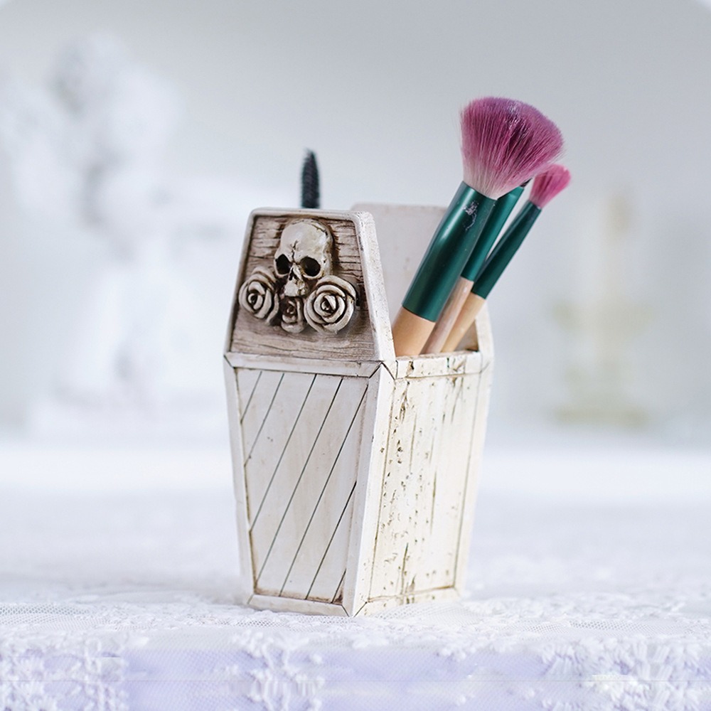Open top coffin desk organizer holding brushes and pens upright