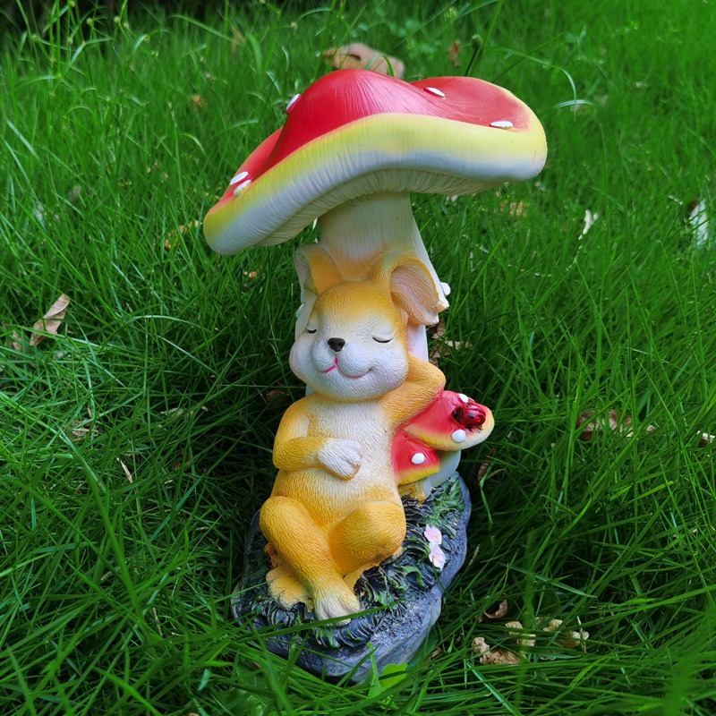 Full figurine standing on grass showing the red mushroom canopy