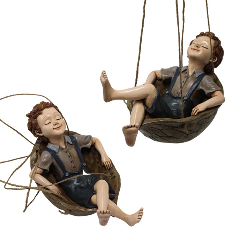 Hanging garden figurine on a swing seat with natural jute details
