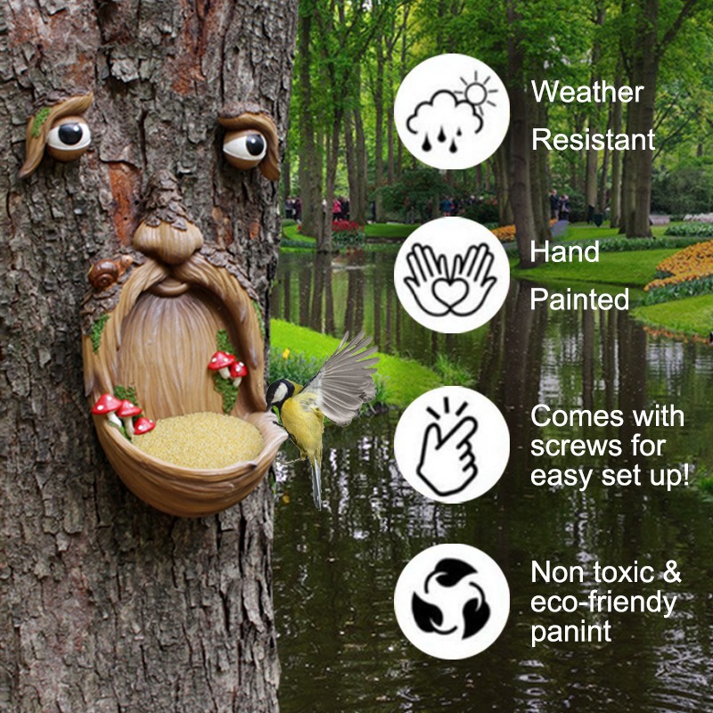 Tree face feeder with seed in the bowl and a bird landing