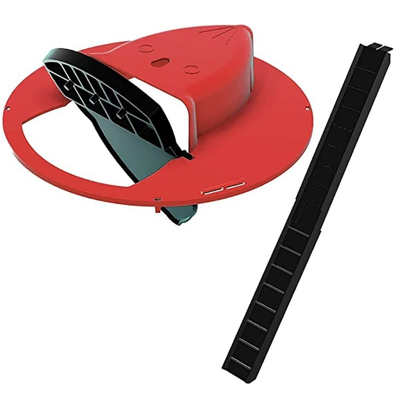 Trap lid and ramp set against the bucket in a tidy kitchen corner