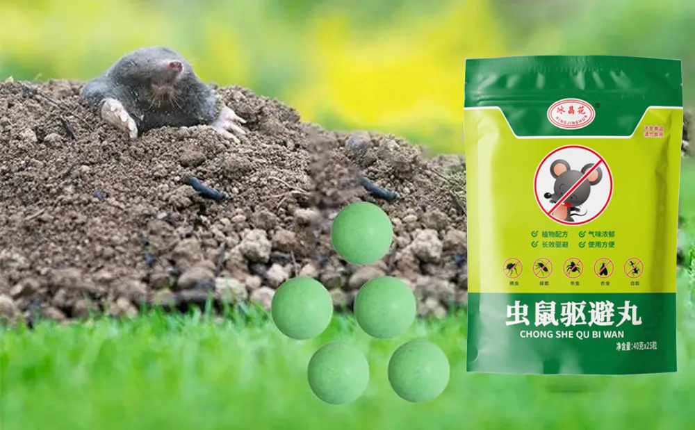 Green repellent balls placed in a lawn beside a mole mound