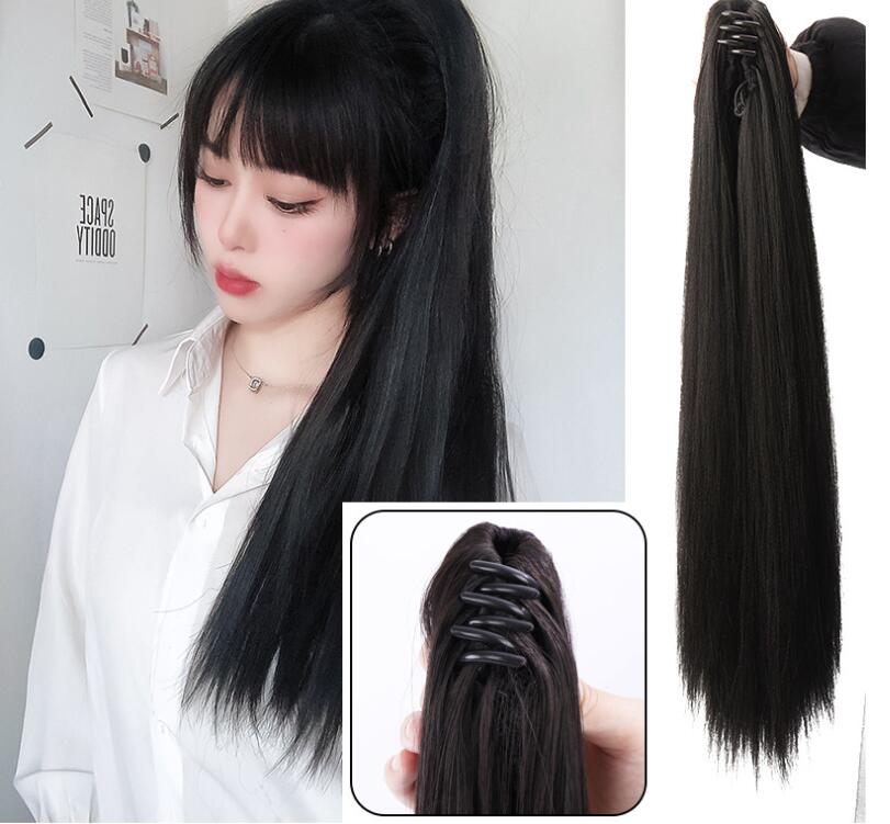 Woman wearing ponytail with grab clip detail