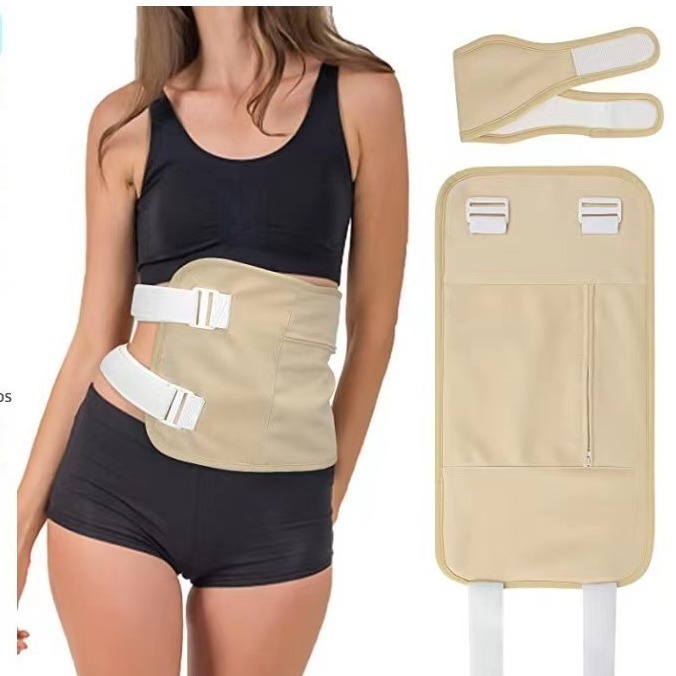 Woman wearing beige castor oil wrap over black sports bra and shorts, showing comfortable fit on abdomen