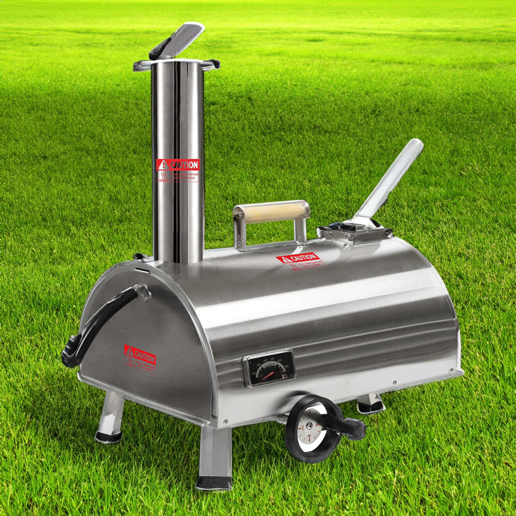 Silver pizza oven with chimney and wheel set on a grass lawn