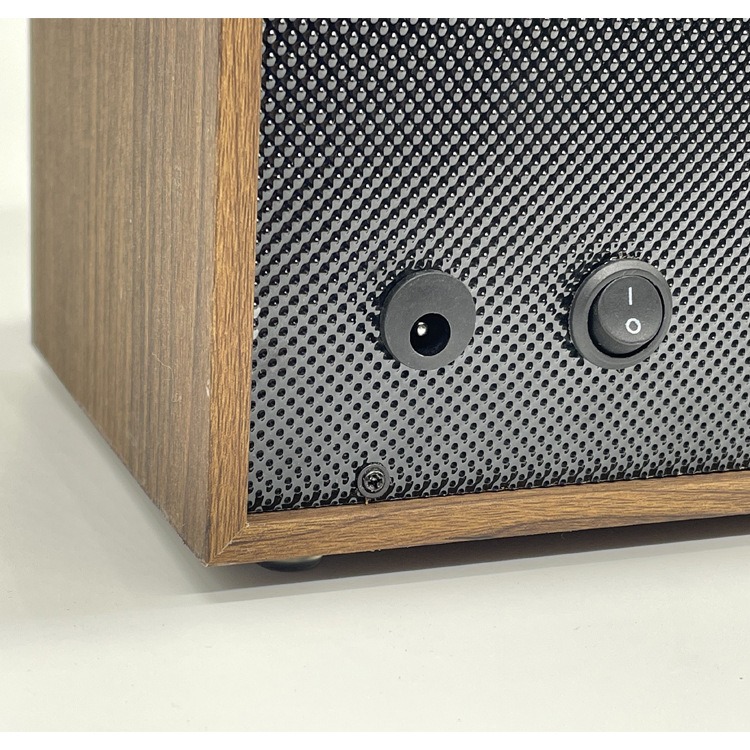 Back corner of walnut winder showing power jack and rocker switch