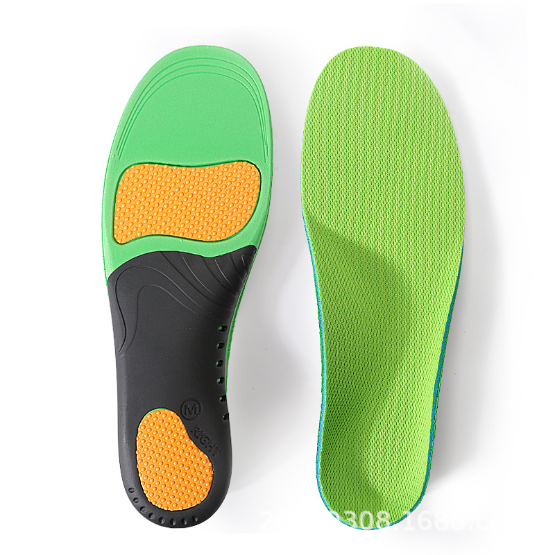 Overhead view of pair of insoles showing lime green mesh top and black support base
