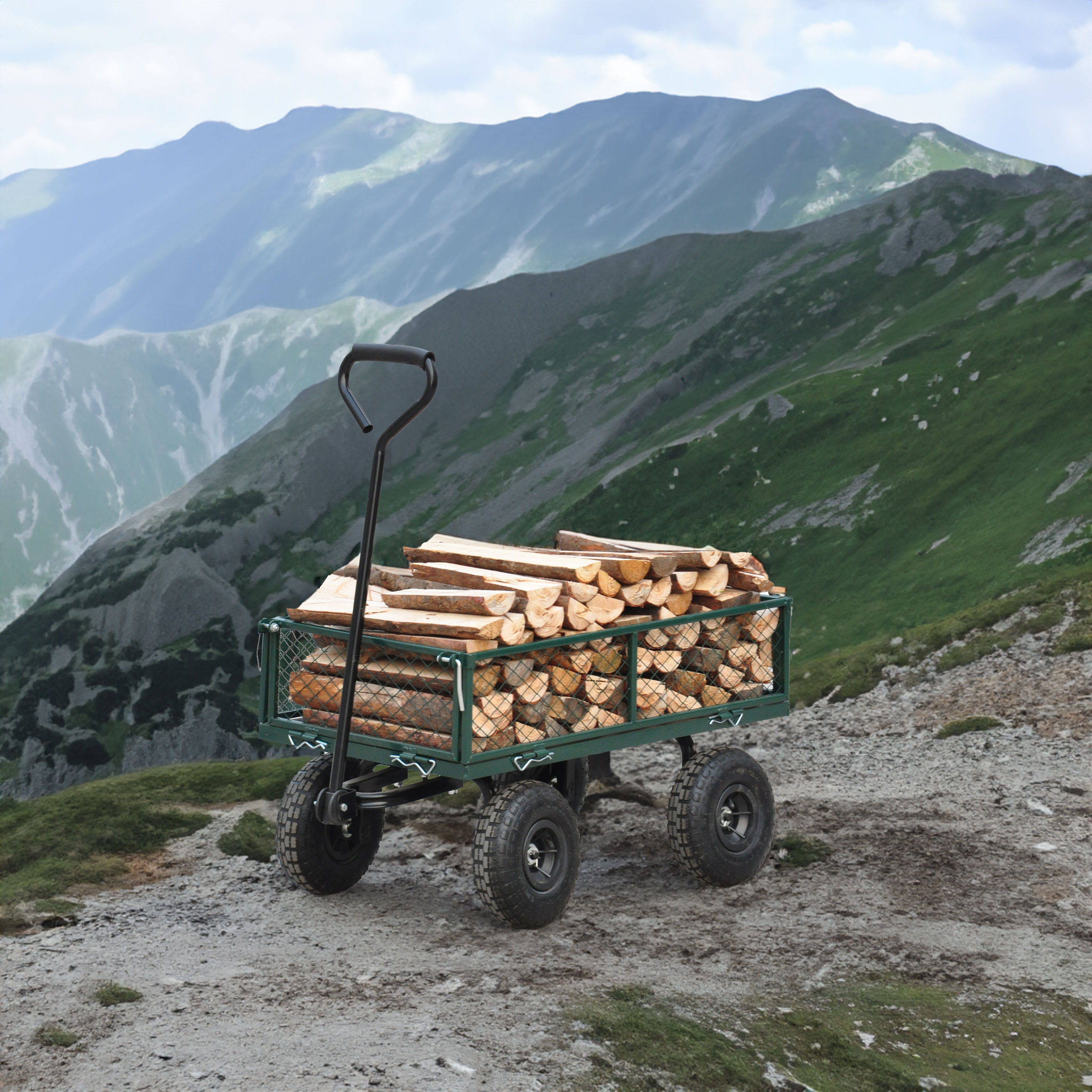 Loaded green wagon with split firewood on a rough trail