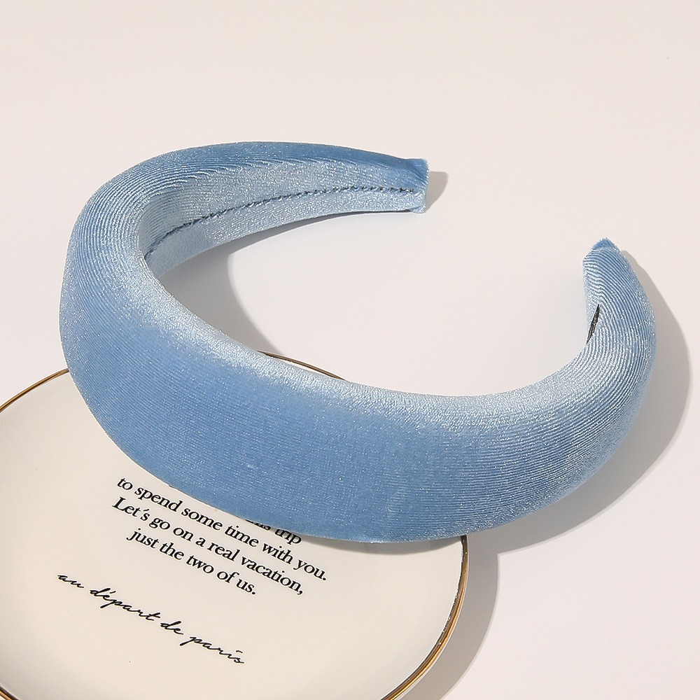 Powder blue headband showing softly lustrous velvet texture