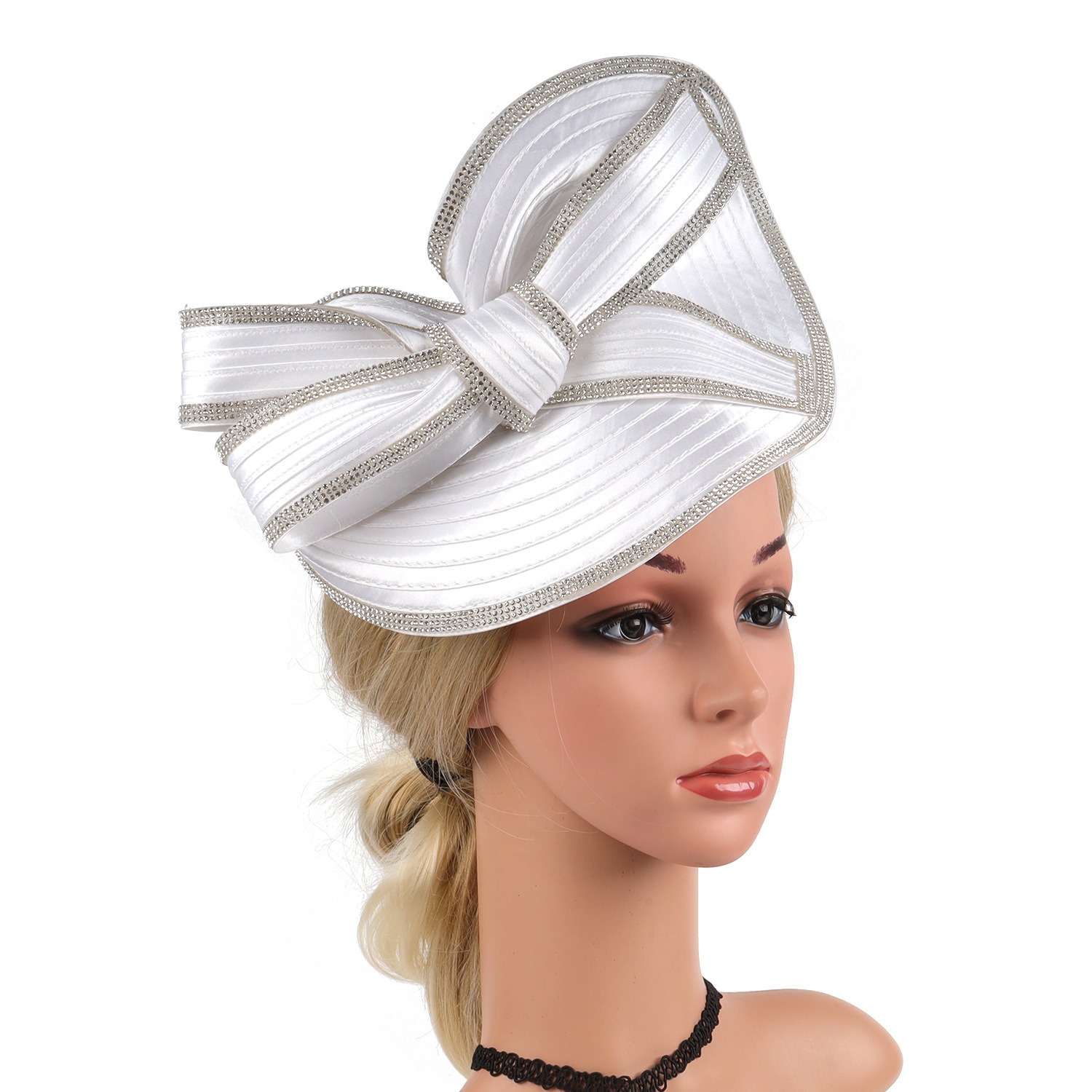 White fascinator styling with broad brim and oversized bow