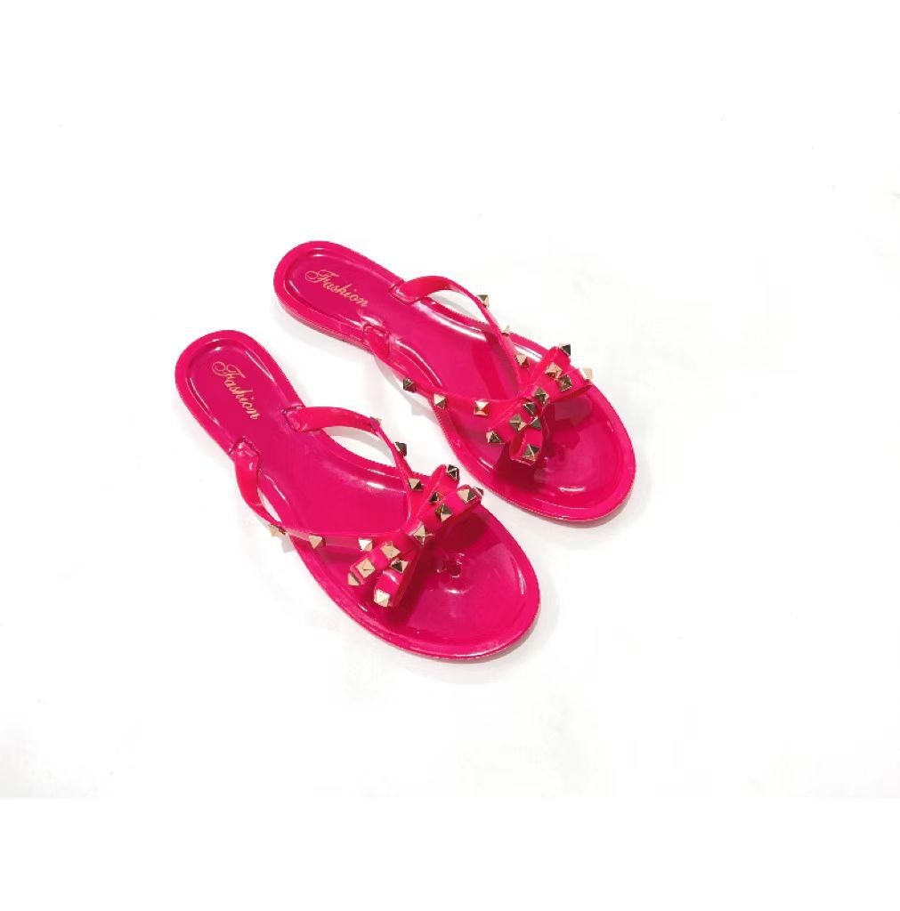 style rivet shoes, bow shaped flip flops, summer beach outings, flat bottomed transparent jelly crystal slippers for women