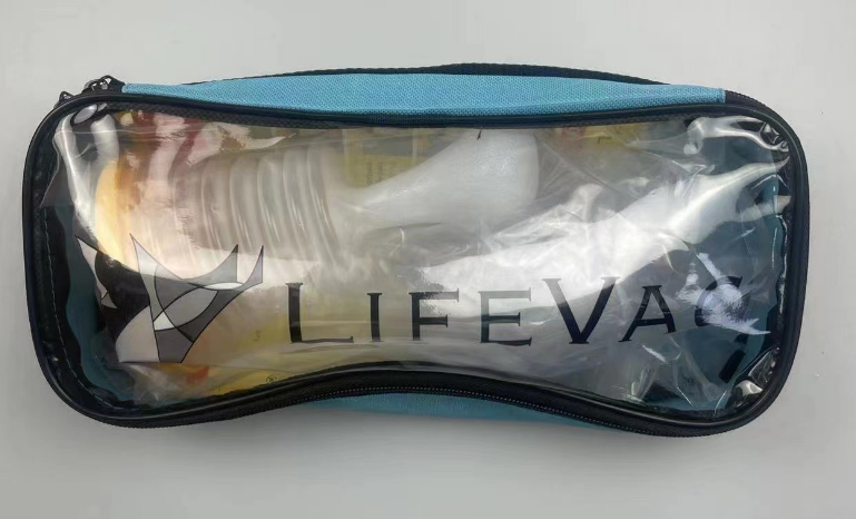 Blue LifeVac carrying case with device and instruction leaflet, illustrating the moment of discovering a reliable, evidence‑based alternative