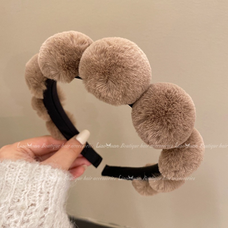 Taupe headband with smooth structured black hoop